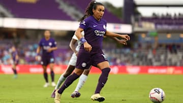 Nov 2, 2024; Orlando, Florida, USA; Orlando Pride forward Marta (10) plays the ball in the first half against Seattle Reign FC at Inter&Co Stadium. Mandatory Credit: Nathan Ray Seebeck-Imagn Images
