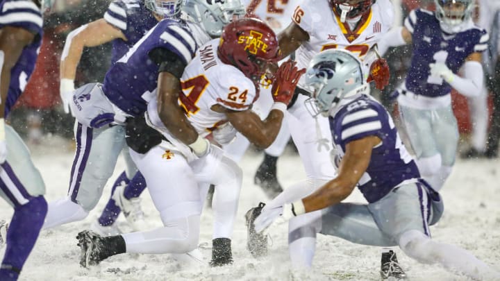 Nov 25, 2023; Manhattan, Kansas, USA; Iowa State Cyclones running back Abu Sama III (24) is tackled during the Cyclone's game against the Kansas State Wildcats.