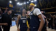 May 3, 2022; Memphis, Tennessee, USA; Memphis Grizzlies guard Ja Morant (12) reacts with forward Ziaire Williams (8) after defeating the Golden State Warriors during game two of the second round for the 2022 NBA playoffs at FedExForum. Mandatory Credit: Petre Thomas-USA TODAY Sports