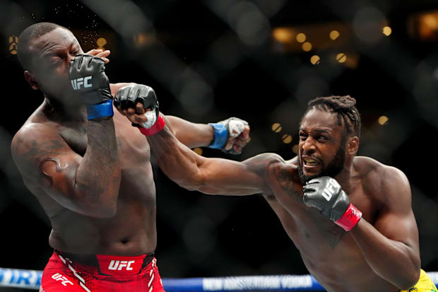 Ryan Spann (red gloves) fights Ovince Saint Preux (blue gloves) during UFC 307 at Delta Center. 