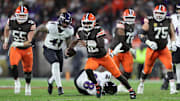 Cleveland Browns quarterback Shedeur Sanders (12) scrambles for yards during the second half of an NFL football game against the Baltimore Ravens at Huntington Bank Field, Nov. 16, 2025, in Cleveland, Ohio.