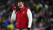 Dec 1, 2025; Foxborough, Massachusetts, USA; New England Patriots head coach Mike Vrabel holds a challenge flag in his hand during the second quarter against the New York Giants at Gillette Stadium. Mandatory Credit: David Butler II-Imagn Images
