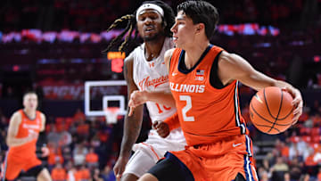 Nov 24, 2025; Champaign, Illinois, USA;  Illinois Fighting Illini guard Andrej Stojakovic (2) drives the ball as U10 defends during the first half at State Farm Center. Mandatory Credit: Ron Johnson-Imagn Images