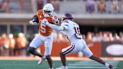 Texas Longhorns wide receiver Ryan Wingo puts a hand out toward Mississippi State Bulldogs safety Kobi Albert in the second half at Darrell K Royal-Texas Memorial Stadium. 