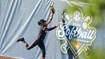 Auburn utility Icess Tresvik (3) makes a circus catch against Alabama in the SEC Tournament, but the Tigers lost 2-1. Auburn plays USF on Friday in the NCAA Tallahassee regional.