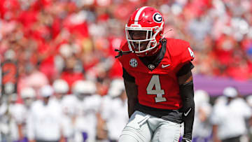 Georgia defensive back KJ Bolden (4) celebrates after sacking Tennessee Tech quarterback Jordyn Potts (5) during the first half of a NCAA college football game against Tennessee Tech in Athens, on Saturday, Sept. 7, 2024.