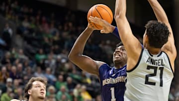 Washington forward Great Osobor presses toward the basket as the Oregon Ducks host the Washington Huskies Tuesday, Jan. 21, 2025, at Matthew Knight Arena in Eugene, Ore.