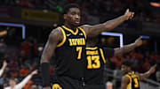 Mar 13, 2025; Indianapolis, IN, USA; Iowa Hawkeyes forward Seydou Traore (7) celebrates after a play during the first half against the Illinois Fighting Illini at Gainbridge Fieldhouse. Mandatory Credit: Robert Goddin-Imagn Images
