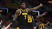 Mar 13, 2025; Indianapolis, IN, USA; Iowa Hawkeyes forward Seydou Traore (7) celebrates after a play during the first half against the Illinois Fighting Illini at Gainbridge Fieldhouse. Mandatory Credit: Robert Goddin-Imagn Images