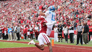Nov 2, 2024; Fayetteville, Arkansas, USA; Ole Miss Rebels wide receiver Jordan Watkins (11) catches a pass for a touchdown in the second quarter against the Arkansas Razorbacks at Donald W. Reynolds Razorback Stadium. Mandatory Credit: Nelson Chenault-Imagn Images