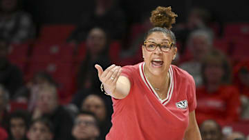 Wisconsin head coach Marisa Moseley has come under fire from former players such as Tessa Towers.