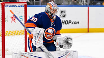 Apr 17, 2024; Elmont, New York, USA;  New York Islanders goaltender Ilya Sorokin (30) makes a save against the Pittsburgh Penguins during the third period at UBS Arena. Mandatory Credit: Dennis Schneidler-Imagn Images