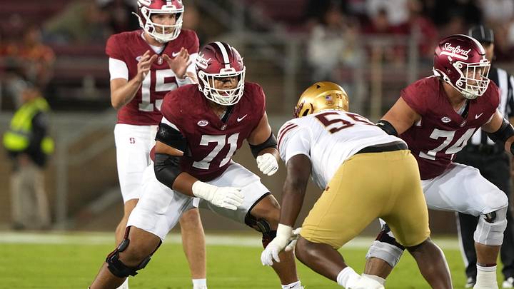 Sep 13, 2025; Stanford, California, USA; Stanford Cardinal offensive lineman Emeka Ugorji (71) blocks Boston College Eagles defensive lineman Kwan Williams (55) during the first quarter at Stanford Stadium. Mandatory Credit: Darren Yamashita-Imagn Images