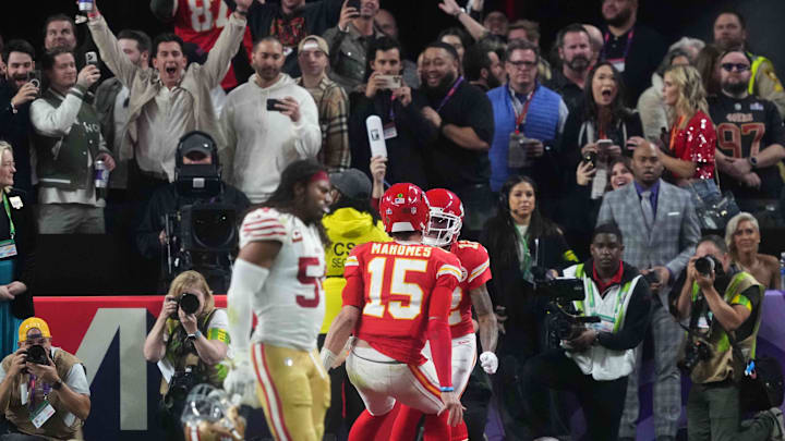 Feb 11, 2024; Paradise, Nevada, USA;   Kansas City Chiefs wide receiver Mecole Hardman Jr. (12) celebrates a touchdown with quarterback Patrick Mahomes (15) to win against the San Francisco 49ers during overtime of Super Bowl LVIII at Allegiant Stadium. Mandatory Credit: Joe Camporeale-Imagn Images