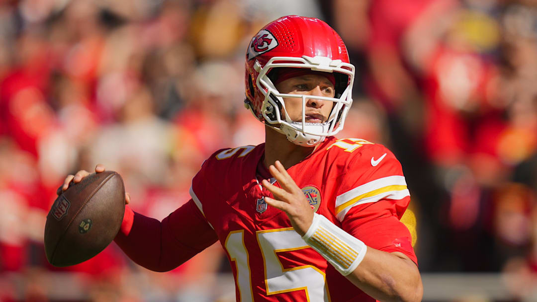 Oct 19, 2025; Kansas City, Missouri, USA; Kansas City Chiefs quarterback Patrick Mahomes (15) throws a pass during the first half against the Las Vegas Raiders at GEHA Field at Arrowhead Stadium. Mandatory Credit: Jay Biggerstaff-Imagn Images