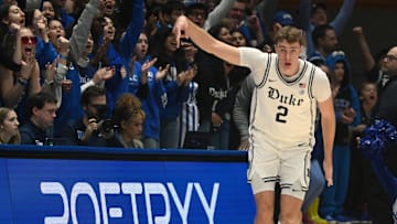 Jan 11, 2025; Durham, North Carolina, USA;  Duke Blue Devils forward Cooper Flagg (2) reacts to hitting a three-pointer during the first half against the Notre Dame Fighting Irish at Cameron Indoor Stadium. Mandatory Credit: Rob Kinnan-Imagn Images