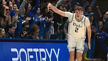 Jan 11, 2025; Durham, North Carolina, USA;  Duke Blue Devils forward Cooper Flagg (2) reacts to hitting a three-pointer during the first half against the Notre Dame Fighting Irish at Cameron Indoor Stadium. Mandatory Credit: Rob Kinnan-Imagn Images