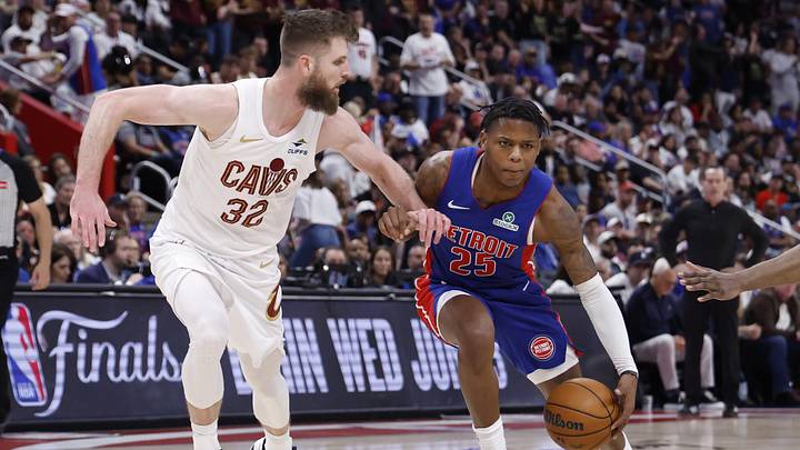 May 17, 2026; Detroit, Michigan, USA; Detroit Pistons guard Marcus Sasser (25) dribbles against Cleveland Cavaliers forward/center Dean Wade (32) in the second half during game seven of the second round of the 2026 NBA Playoffs at Little Caesars Arena. 