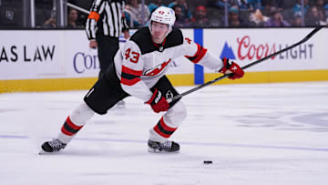 Oct 30, 2025; San Jose, California, USA;  New Jersey Devils defenseman Luke Hughes (43) looks to shoot against the San Jose Sharks in the second period at SAP Center at San Jose. Mandatory Credit: David Gonzales-Imagn Images