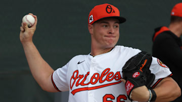 Feb 16, 2025; Sarasota, FL, USA; Baltimore Orioles pitcher Justin Armbruester (66)  throws a bullpen session during spring training workouts at Ed Smith Stadium. Mandatory Credit: Kim Klement Neitzel-Imagn Images