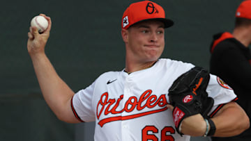 Feb 16, 2025; Sarasota, FL, USA; Baltimore Orioles pitcher Justin Armbruester (66)  throws a bullpen session during spring training workouts at Ed Smith Stadium. 