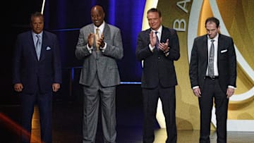 John Calipari (from left), Sidney Moncrief, Bill Self and Sean Sutton at the 2021 Basketball Hall of Fame Enshrinement Ceremony
