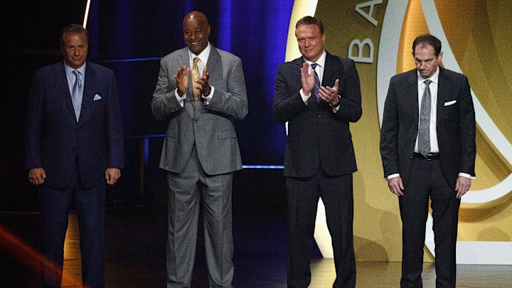 John Calipari (from left), Sidney Moncrief, Bill Self and Sean Sutton at the 2021 Basketball Hall of Fame Enshrinement Ceremony