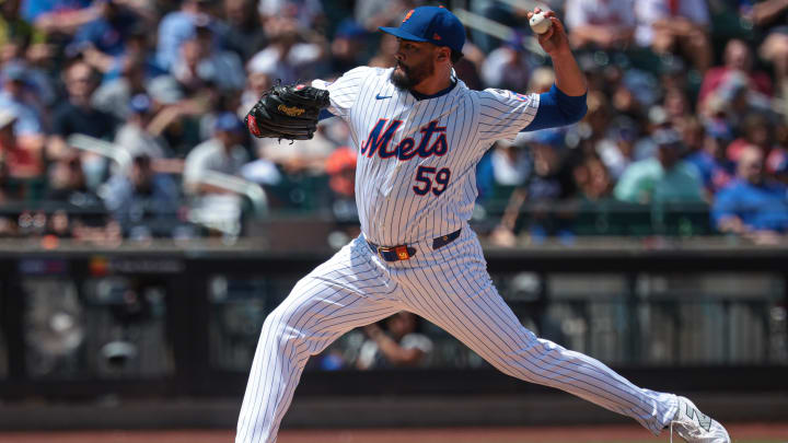 Aug 21, 2024; New York City, New York, USA; New York Mets starting pitcher Sean Manaea (59) delivers a pitch during the second inning against the Baltimore Orioles at Citi Field. Mandatory Credit: Vincent Carchietta-USA TODAY Sports