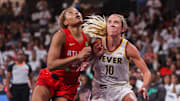 Sep 14, 2025; College Park, Georgia, USA; Atlanta Dream forward Naz Hillmon (00) boxes out Indiana Fever guard Lexie Hull (10) in the second quarter during game one of round one for the 2025 WNBA Playoffs at Gateway Center Arena at College Park. Mandatory Credit: Brett Davis-Imagn Images
