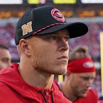 Sep 9, 2024; Santa Clara, California, USA; San Francisco 49ers running back Christian McCaffrey (23) watches injured from the sidelines in the second quarter against the New York Jets at Levi's Stadium. Mandatory Credit: David Gonzales-Imagn Images