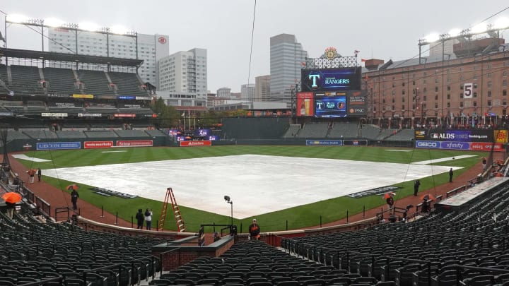 Oct 7, 2023; Baltimore, Maryland, USA; Rain falls on the field prior to the Baltimore Orioles game