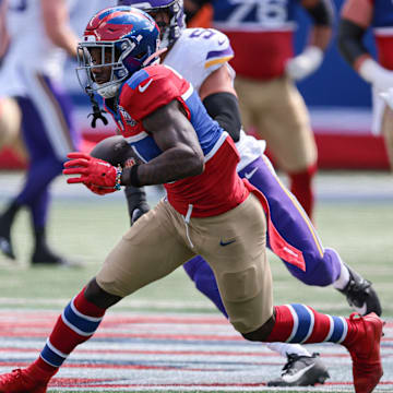 Sep 8, 2024; East Rutherford, New Jersey, USA; New York Giants wide receiver Malik Nabers (1) gains yards after catch during the first half against the Minnesota Vikings at MetLife Stadium.  