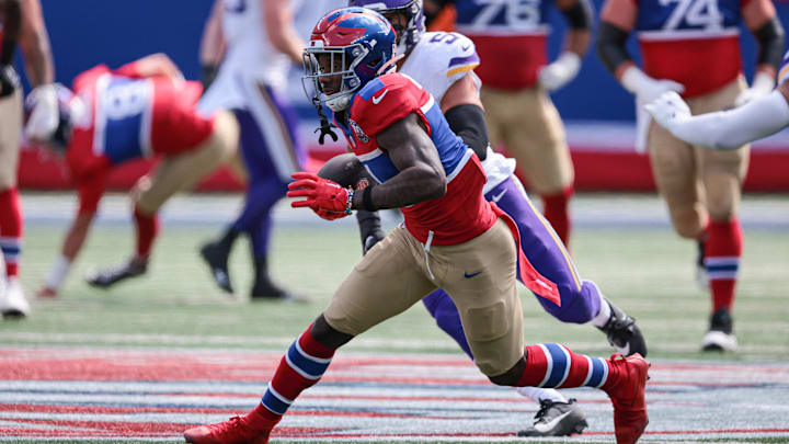 Sep 8, 2024; East Rutherford, New Jersey, USA; New York Giants wide receiver Malik Nabers (1) gains yards after catch during the first half against the Minnesota Vikings at MetLife Stadium.  