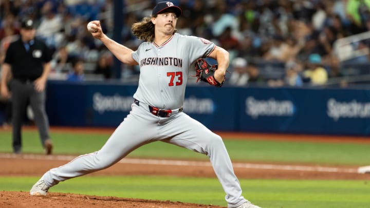 Jun 29, 2024; St. Petersburg, Florida, USA; Washington Nationals pitcher Hunter Harvey (73) pitches the ball against the Tampa Bay Rays during the eighth inning at Tropicana Field. Mandatory Credit: Matt Pendleton-USA TODAY Sports