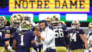 Jan 20, 2025; Atlanta, GA, USA; Notre Dame Fighting Irish head coach Marcus Freeman reacts after a play against the Ohio State Buckeyes during the second half the CFP National Championship college football game at Mercedes-Benz Stadium. Mandatory Credit: Mark J. Rebilas-Imagn Images