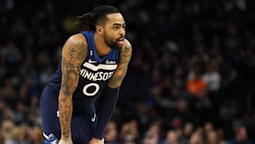Jan 19, 2023; Minneapolis, Minnesota, USA; Minnesota Timberwolves guard D'Angelo Russell (0) reacts to a foul call against the Toronto Raptors during the first quarter at Target Center. Mandatory Credit: Matt Krohn-Imagn Images
