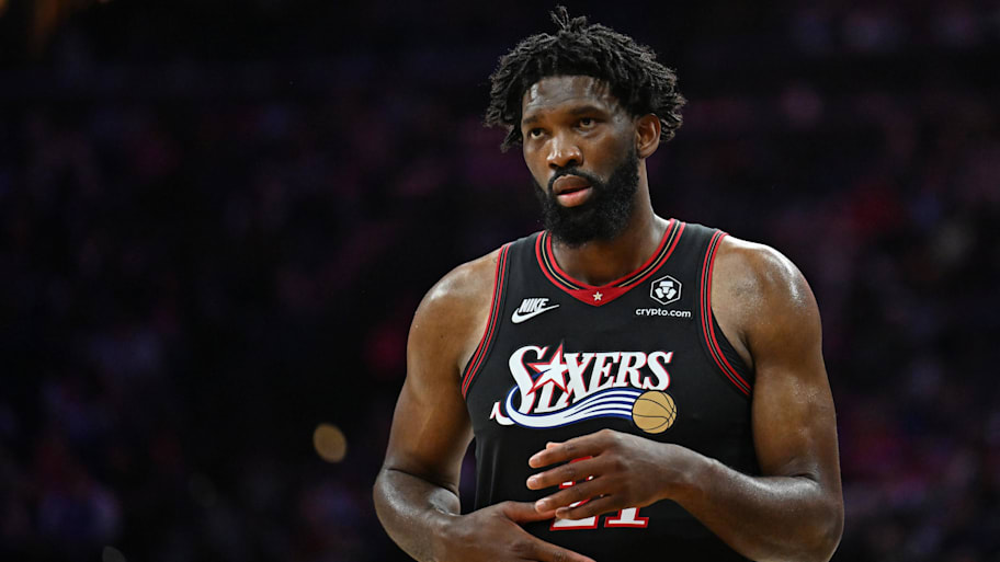 76ers center Joel Embiid reacts against the Celtics.