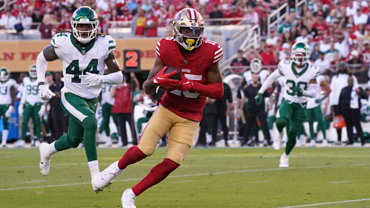Sep 9, 2024; Santa Clara, California, USA; San Francisco 49ers wide receiver Jauan Jennings (15) advances upfield after a catch in the second quarter against the New York Jets at Levi's Stadium. Mandatory Credit: David Gonzales-Imagn Images Sep 9, 2024; Santa Clara, California, USA; San Francisco 49ers wide receiver Jauan Jennings (15) advances upfield after a catch in the second quarter against the New York Jets at Levi's Stadium. Mandatory Credit: David Gonzales-Imagn Images