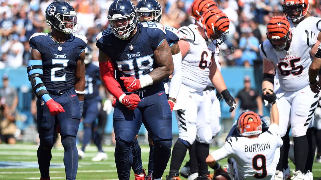 Oct 1, 2023; Nashville, Tennessee, USA; Tennessee Titans defensive tackle Jeffery Simmons (98) celebrates after a sack against Cincinnati Bengals quarterback Joe Burrow (9) during the first half at Nissan Stadium. Mandatory Credit: Christopher Hanewinckel-USA TODAY Sports Oct 1, 2023; Nashville, Tennessee, USA; Tennessee Titans defensive tackle Jeffery Simmons (98) celebrates after a sack against Cincinnati Bengals quarterback Joe Burrow (9) during the first half at Nissan Stadium. Mandatory Credit: Christopher Hanewinckel-USA TODAY Sports