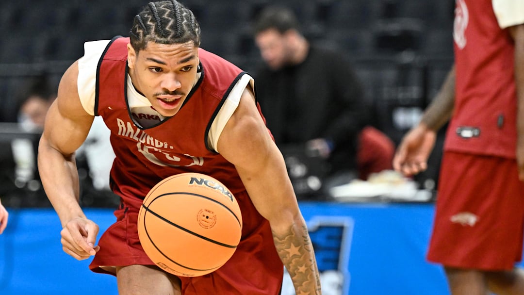 Arkansas Razorbacks guard Darius Acuff Jr. (5) dribbles the ball during a practice session ahead of the first round of the men's 2026 NCAA Tournament at Moda Center. Arkansas Razorbacks guard Darius Acuff Jr. (5) dribbles the ball during a practice session ahead of the first round of the men's 2026 NCAA Tournament at Moda Center.