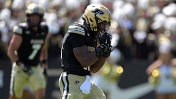 Purdue Boilermakers linebacker Mani Powell (16) celebrates a sack