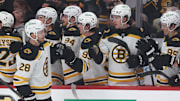 Apr 13, 2025; Pittsburgh, Pennsylvania, USA;  Boston Bruins center Elias Lindholm (28) celebrates his goal with the Boston bench against the Pittsburgh Penguins during the first period at PPG Paints Arena. Mandatory Credit: Charles LeClaire-Imagn Images