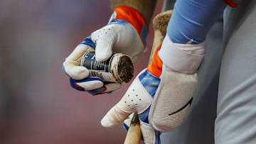 May 10, 2023; Cincinnati, Ohio, USA; New York Mets first baseman Pete Alonso (20) prepares his bat on deck during the fifth inning against the Cincinnati Reds at Great American Ball Park. Mandatory Credit: Katie Stratman-Imagn Images