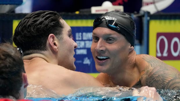 Jack Alexy celebrates with Caeleb Dressel after finishing second and third in the 100-meter freestyle final at Olympic Trials