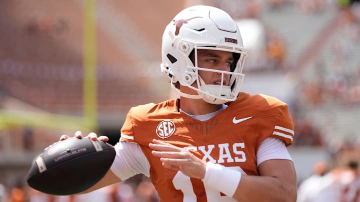 Texas quarterback Arch Manning (16) warms up before a game against UTEP at Darrell K Royal-Texas Memorial Stadium. 