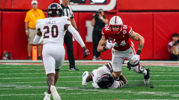 Nebraska Cornhuskers tight end Thomas Fidone II (24) is tackled during the second quarter against Northern Illinois