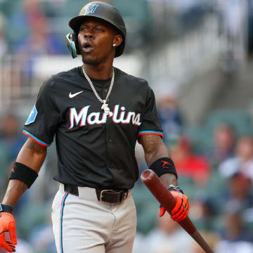 Apr 24, 2024; Atlanta, Georgia, USA; Miami Marlins center fielder Jazz Chisholm Jr. (2) reacts after a strikeout against the Atlanta Braves in the first inning at Truist Park.