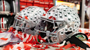 Jan 20, 2025; Atlanta, GA, USA; Detailed view of confetti with an Ohio State Buckeyes helmet after winning the CFP National Championship college football game at Mercedes-Benz Stadium. Mandatory Credit: Mark J. Rebilas-Imagn Images