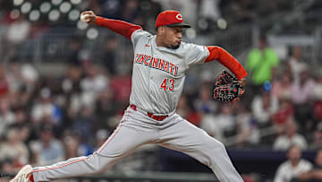 Sep 9, 2024; Cumberland, Georgia, USA; Cincinnati Reds relief pitcher Alexis Diaz (43) pitches against the Atlanta Braves during the ninth inning at Truist Park. Mandatory Credit: Dale Zanine-Imagn Images