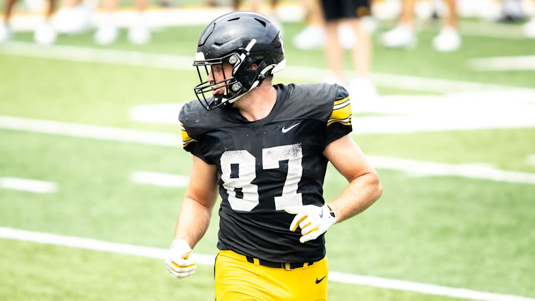 Aug 9, 2025; Iowa tight end Addison Ostrenga (87) lines up during the Hawkeyes Kids Day NCAA football open practice at Kinnick Stadium in Iowa City, Iowa. Mandatory Credit: Joseph Cress for the Des Moines Register